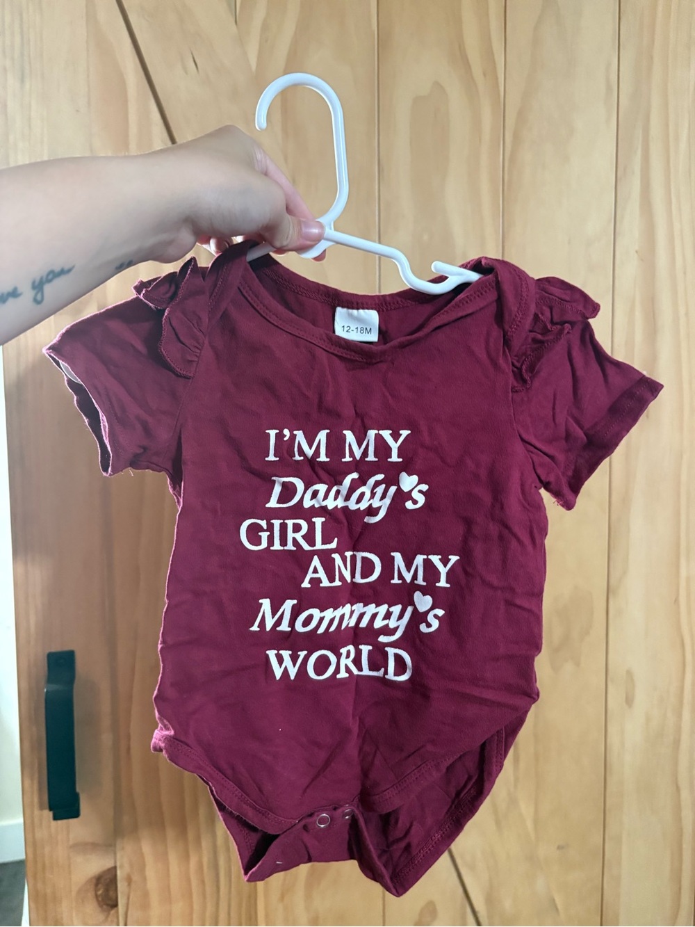 Maroon Baby One-Piece Bodysuit with floral shorts
